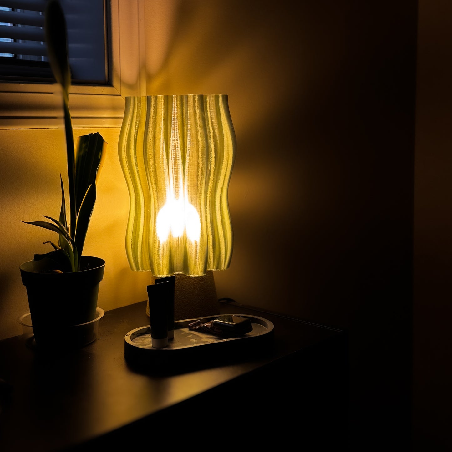 Warm Distant Glow from The Olive Modern Table Lamp