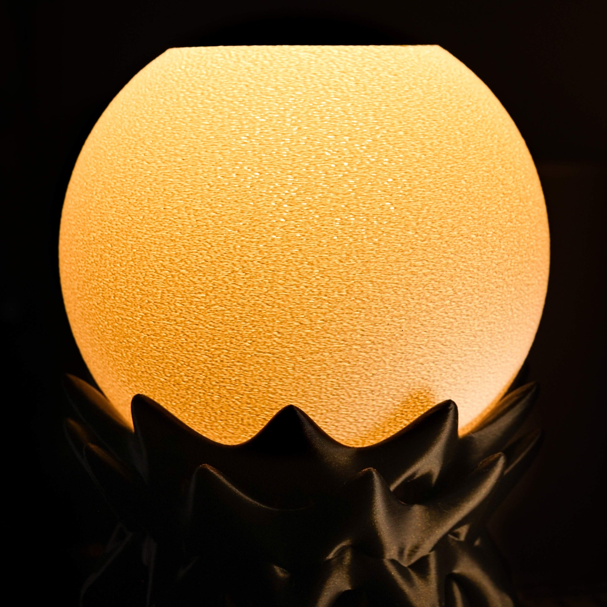 Sci-Fi themed lamp glowing on a black background